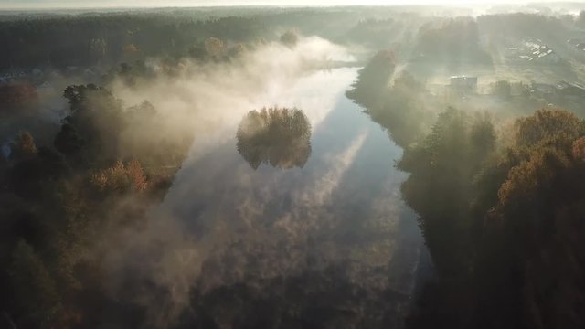 Morning smoke on the water Ulbroka lake Aerial drone top view 4K UHD video Latvia 