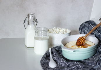 Cottage cheese casserole and dairy products (milk and cottage cheese) on a white background. Healthy breakfast.