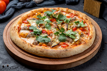 Pizza with meat and eggplant