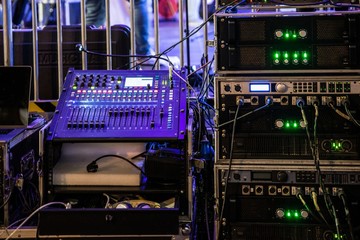 Dj mixing console and music audio amplifiers © Daniel Jędzura