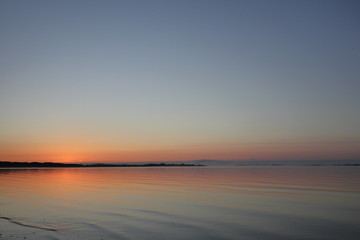 Fototapeta na wymiar Morning sky above the bay