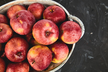 Fresh organic red apples in a basket
