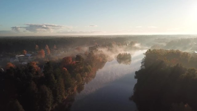 Morning smoke on the water Ulbroka lake Aerial drone top view 4K UHD video Latvia 