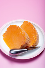 Two pieces of native French aged cheese Mimolette, produced in Lille with greyish curst made by special cheese mites