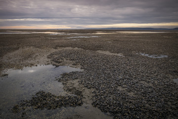 Sunset over Carmarthen Bay estuary at low tide