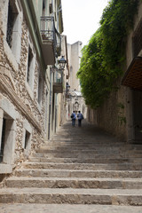 Small medieval street in Girona city, Catalonia, Spain