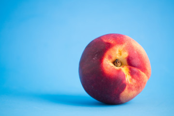 Nectarines on a colored background