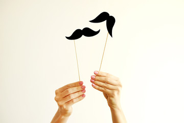 Movember concept. November is month of men health issues and prostate cancer awareness. Young woman...