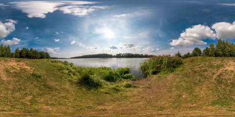 full seamless spherical panorama 360 by 180 angle view on the shore of width river neman in sunny...