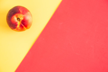 Nectarines on a colored background