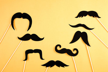 Movember concept. Annual event involving growing of moustache & beard during month in November to...