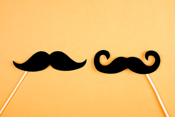 Movember concept. Annual event involving growing of moustache & beard during month in November to...