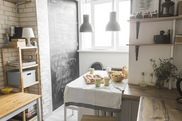 the interior of a cozy kitchen.