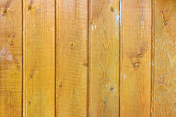 Naklejka premium Yellow painted old wooden planks texture. Abstract wooden background