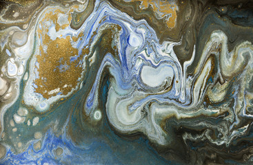 Gold marbling texture design. Blue and golden marble pattern. Fluid art.