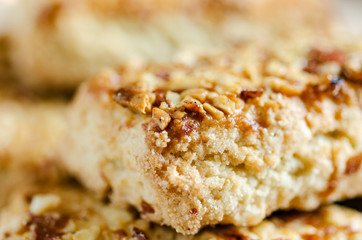 Cookies with nuts on a saucer. Food background