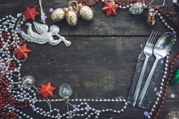 Christmas background with decorations  on wooden board. Copy space. Text.