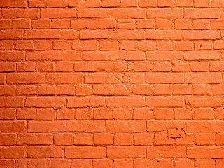 Texture brick masonry painted in red. Close-up, Building background