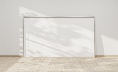 Large horizontal frame leaning on a white wall 3D rendering - obrazy, fototapety, plakaty