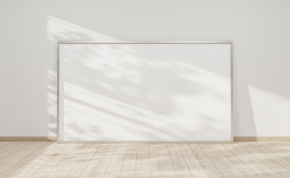 Large horizontal frame leaning on a white wall 3D rendering