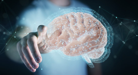 Businessman using digital 3D projection of a human brain 3D rendering