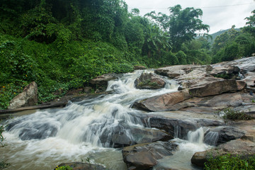 Waterfalls flowing down from the stream at 