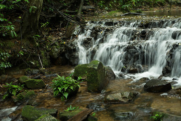Waterfalls flowing down from the stream at 