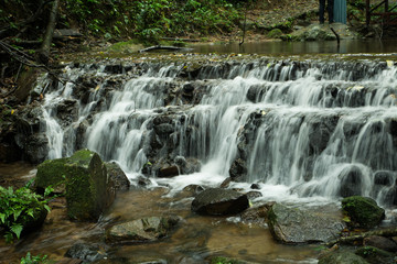 Fototapeta premium Waterfalls flowing down from the stream at 