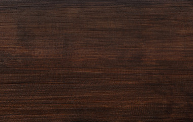 close up of dark brown wooden board texture