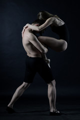 Fototapeta na wymiar beautiful man and woman dancing ballet