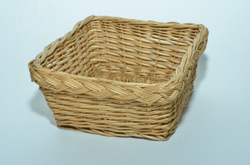 beige braid is on the table, basket for accessories