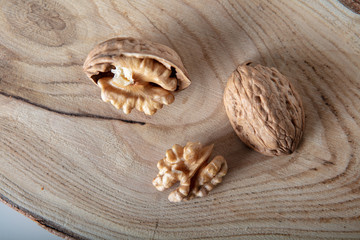 Walnuts on a wooden plate  ..
