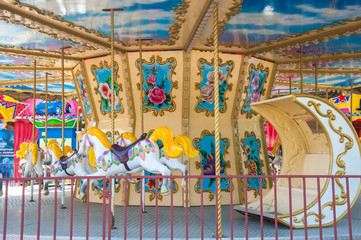Fototapeta premium carousel in the recreation park, spinning in the carousel