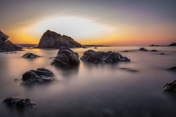 Sunset, rocks and Bridge Long Exposure