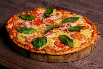 Pizza with ham and potato