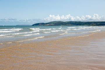 View of the sea and beach at Benllech in Anglesey North Wales UK