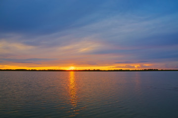 Lake at sunset in summer.
