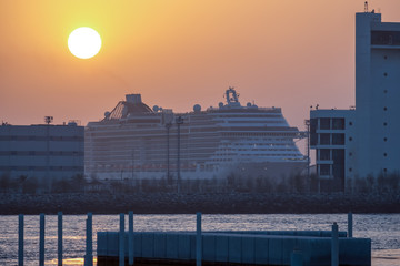 Massive Cruise ship at jetty from distance - Abu Dhabi, Sheikh Zayed Port