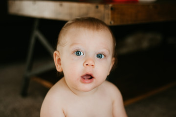 Adorable Baby Boy Playing in the Living Room 