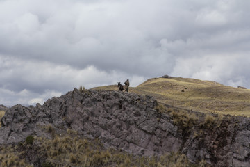 man on top of mountain