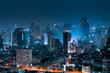 Fototapeta premium Bangkok beautiful skyscraper in business travel district at night in town center.