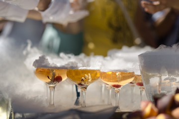 Champagne glasses on gold background. Party and holiday celebration concept