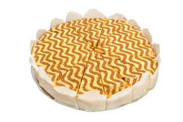 Dark chocolate vegan cake with candies and nuts on white background