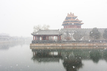 Corner tower of the Forbidden City in winter season.