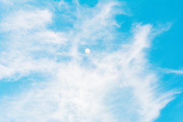 Cloudy Emerald Sky with balloons