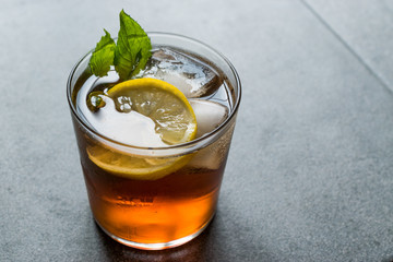 Cold Iced Tea Bergamot with Mint Leaves, Lemon and Ice.