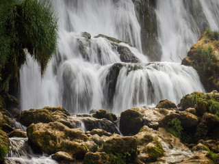 Beautiful Kravica waterfall in Bosnia and Herzegovina - popular swimming and picnic area for tourists
