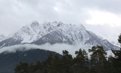 Fototapeta na wymiar whitewashed peak of a Dolomites mountain