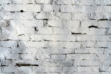 brick wall painted white paint