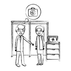 man and woman doctor in consultation room monitor machine